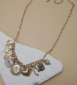 Charm necklace – custard bow heart pearl link